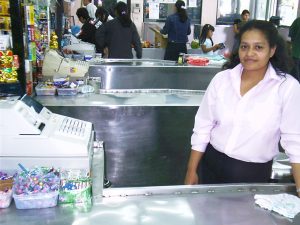 Cashier_at_her_register-300x225.jpg