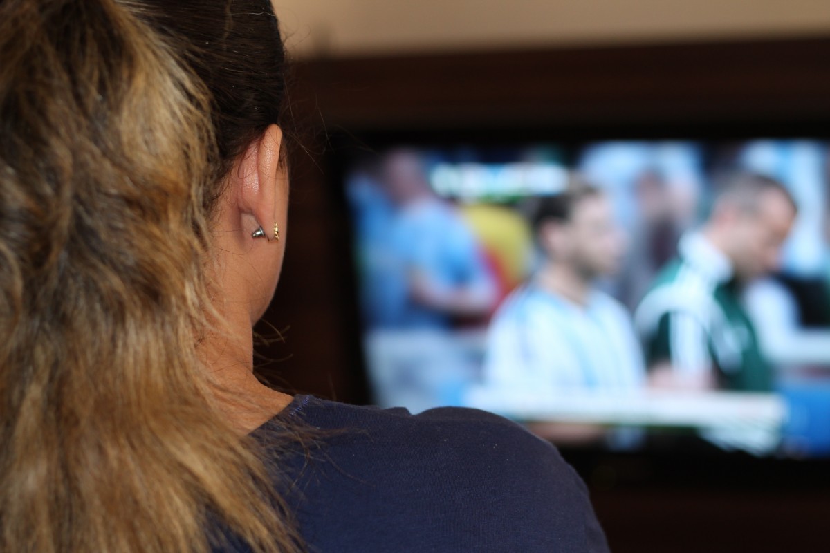 woman_watching_tv_tv_fifa_world_cup_game_football_cheerleader-953567-1551765301170.jpg