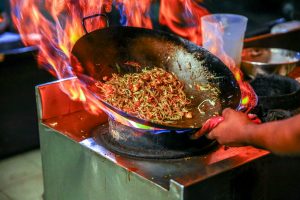 person-cooking-noodles-3054690-300x200.jpg