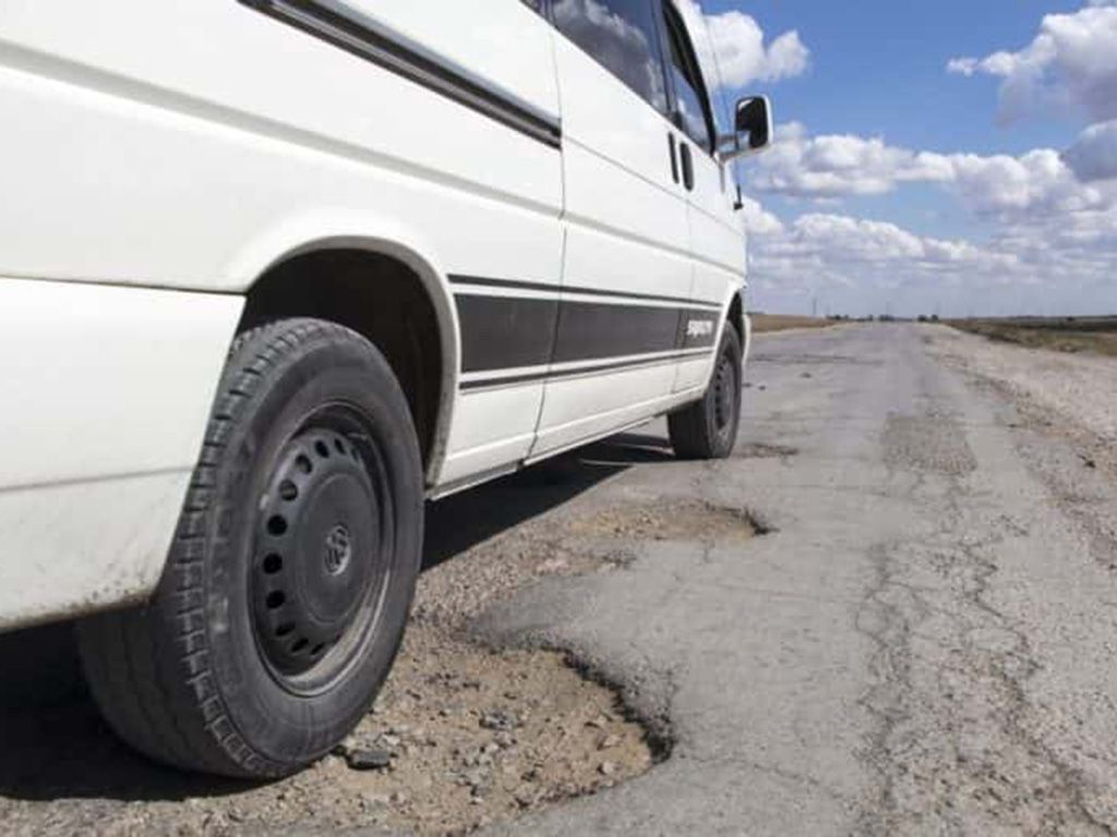 resizepothole-road-kazakhstan-hole-asphalt-wallpaper-preview-768x511-1.jpg.optimal.jpg